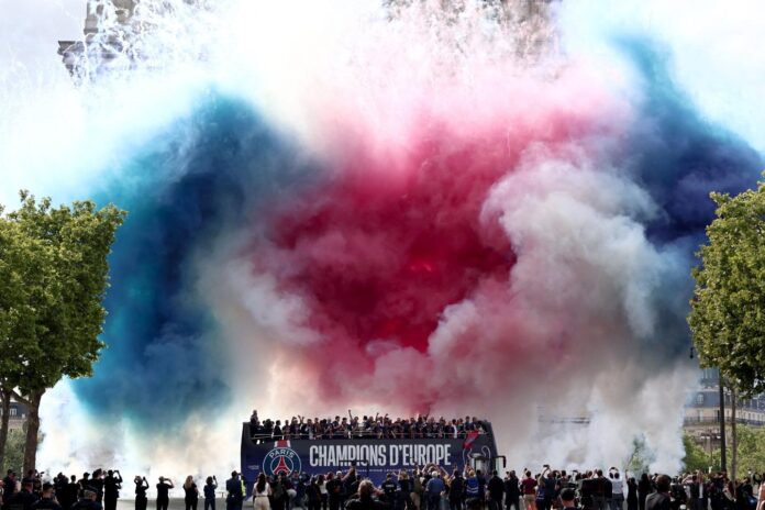 PSG holds victory parade in Paris with Champions League trophy after overnight violence