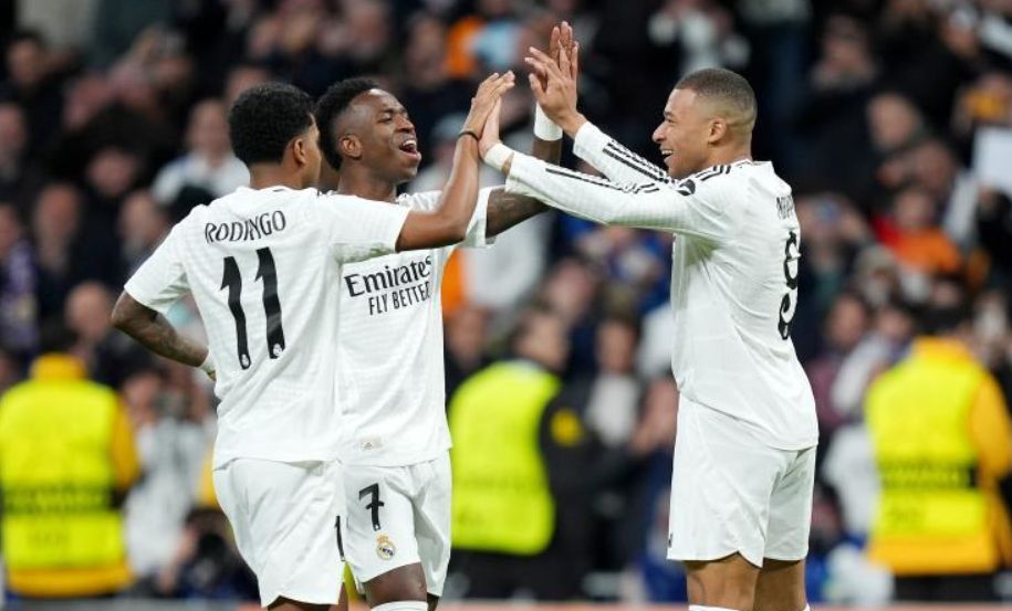 Rodrygo, Mbappe and Vinicius celebrate.