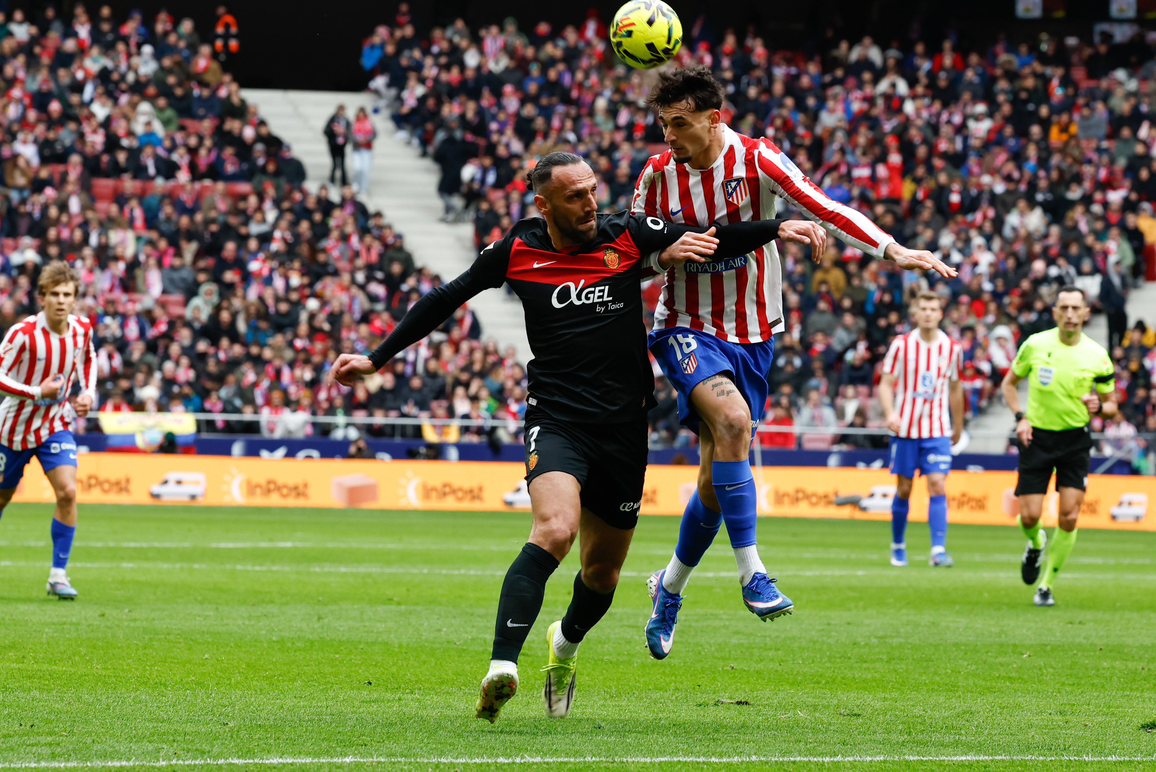 MADRID, 25/01/2026.- Marc Pubill battles with Vedat Muriqi, of Mallorca.
